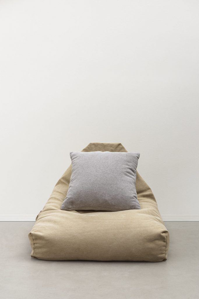 Minimal gray printed cushion on a bean bag minimal interior desi